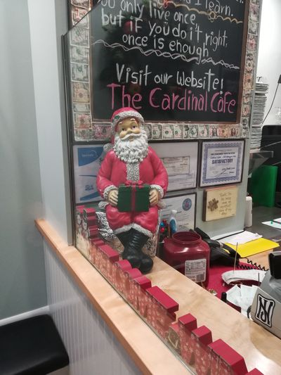 Santa enjoys sitting and watching everyone enjoy their breakfasts and lunches.